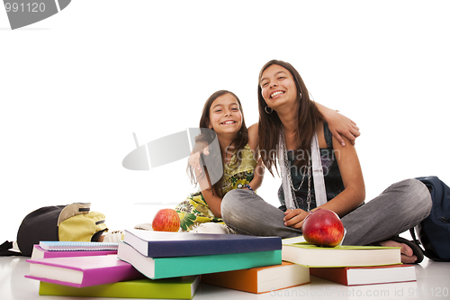Image of two young student sisters