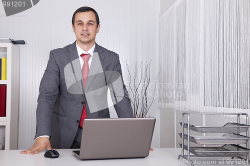 Image of Powerful businessman at the office