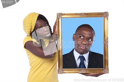 Image of African woman holding a portrait of a businessman