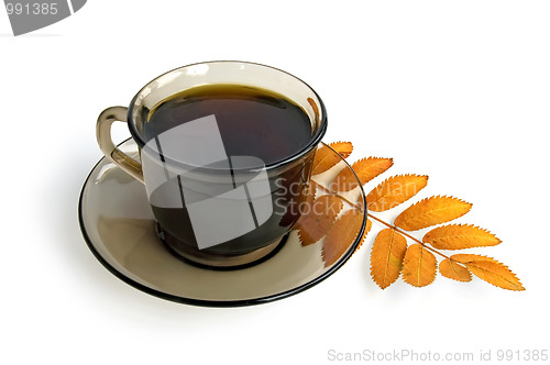 Image of Coffee-brown cup with a mountain ash leaf