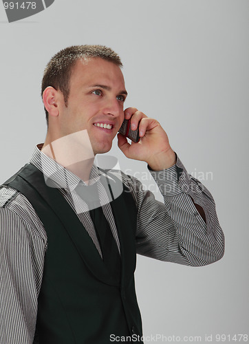 Image of Young man on the phone