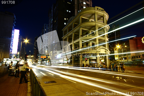 Image of Fast moving cars at night 