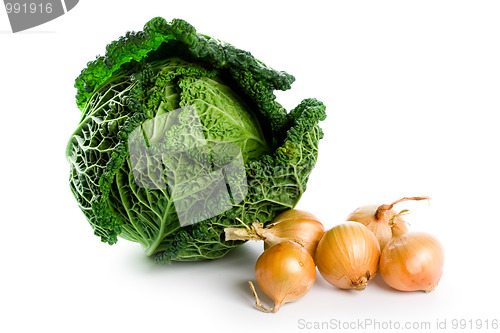 Image of fresh savoy cabbage an isd five onions