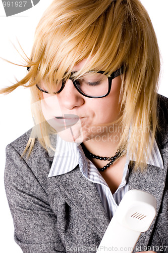 Image of tired businesswoman with phone