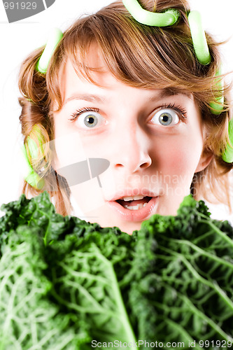 Image of woman and fresh savoy cabbage
