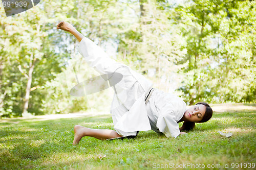 Image of Asian practicing karate