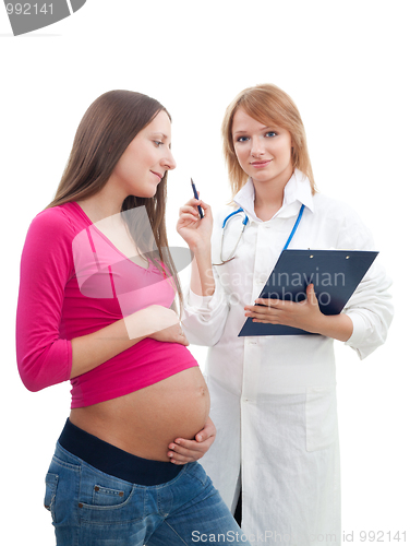 Image of Pregnant woman consulting from doctor