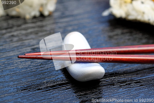 Image of chopsticks sushi