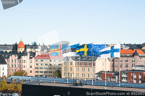 Image of Fluttering Scandinavian flags against the sky