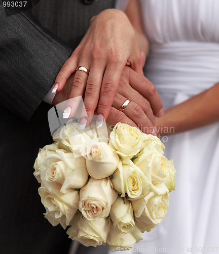 Image of Holding a wedding bouquet