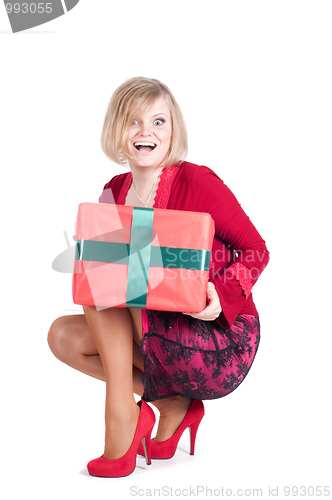 Image of Happy woman with Christmas presents