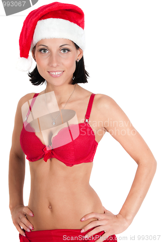 Image of Portrait of beautiful woman in red santa hat