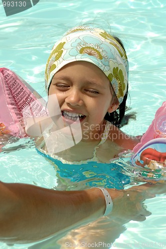 Image of Happy child in pool