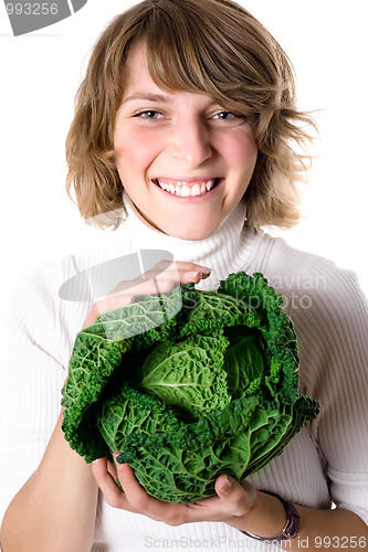 Image of woman with fresh savoy cabbage