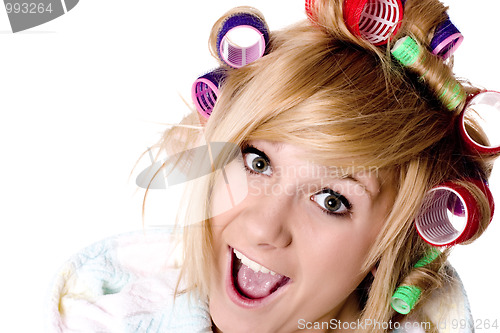 Image of funny housewife with curlers
