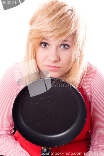 Image of sad housewife with pan