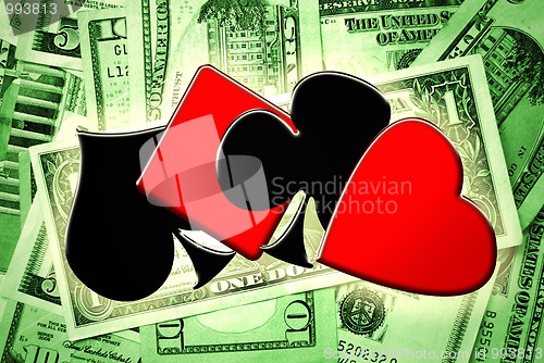 Image of Playing cards suits and money