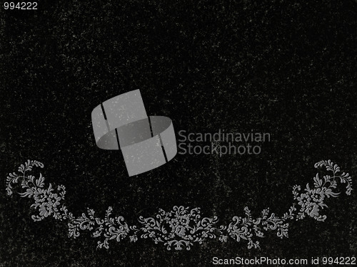 Image of decorated granite gravestone