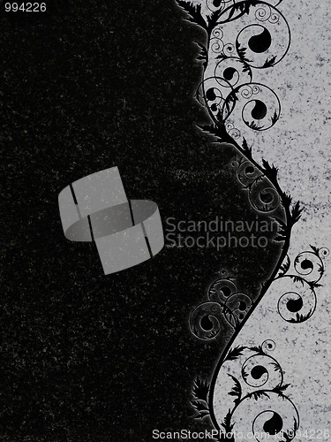 Image of decorated granite gravestone