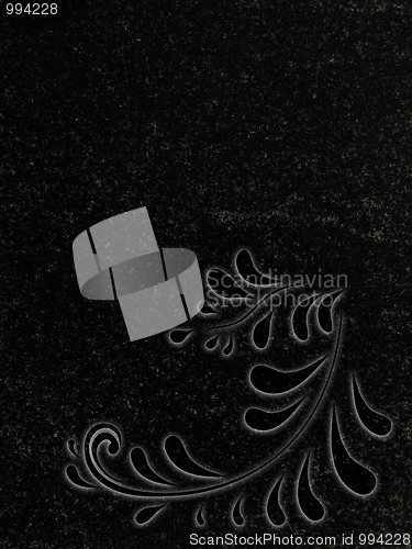 Image of decorated granite gravestone