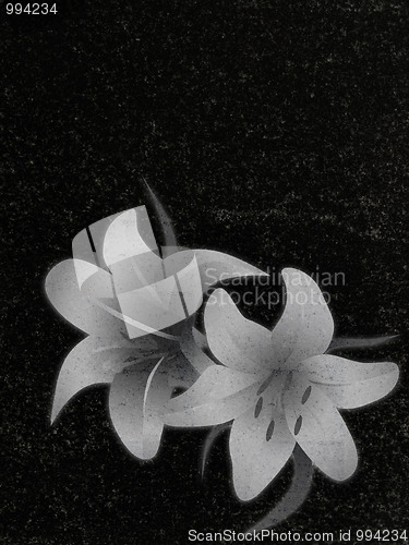 Image of decorated granite gravestone