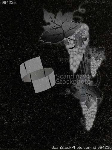 Image of decorated granite gravestone