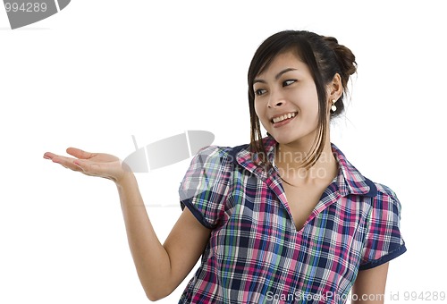 Image of woman holding something