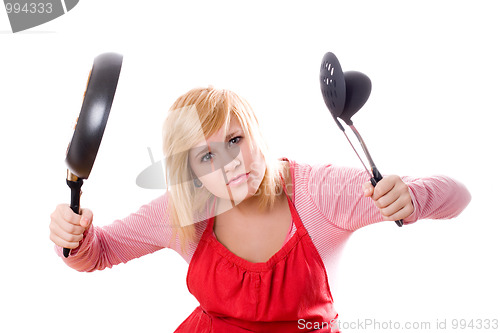 Image of pretty housewife with kitchen utensil and pan