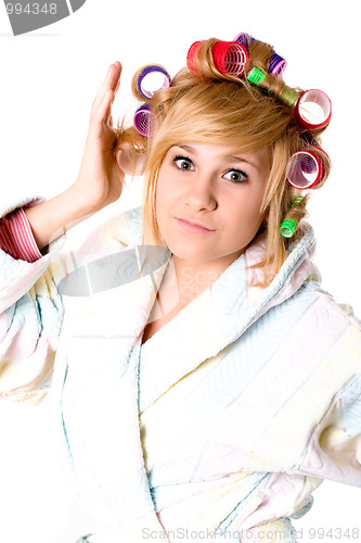 Image of funny housewife with curlers