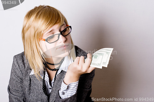 Image of businesswoman with money