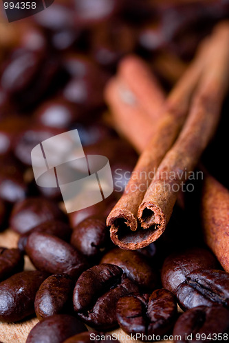Image of coffee beans and cinnamon sticks
