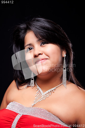 Image of happy large latin woman, well dressed