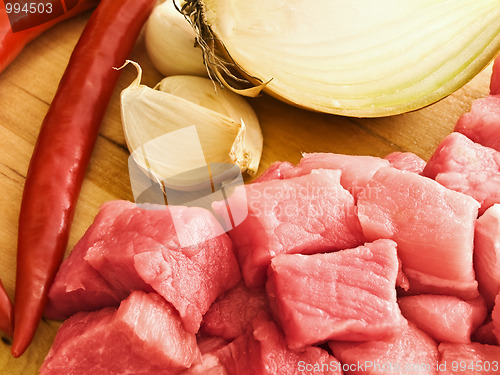 Image of meat,pepper,garlic and onion