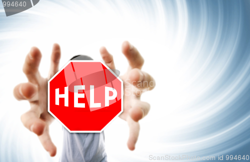 Image of Man grabing a help sign.