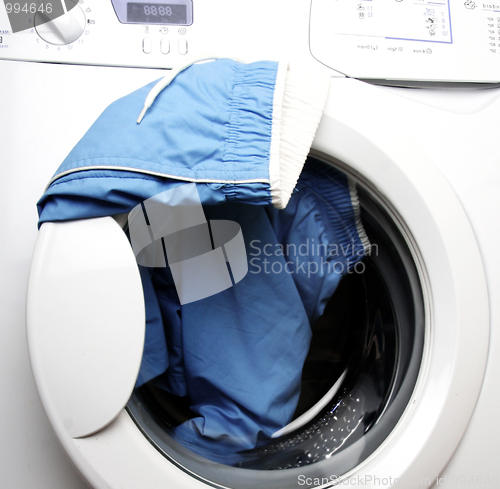 Image of Trousers and laundry.