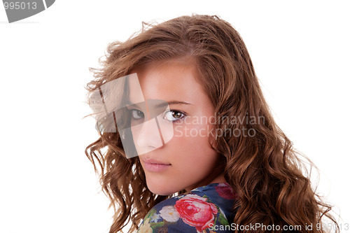 Image of beautiful and sad young woman, looking back