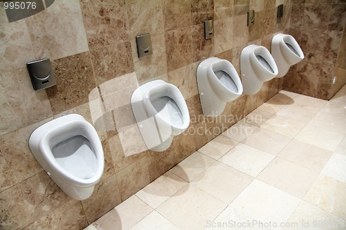 Image of urinals in restroom