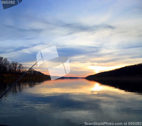 Image of fishing on evening river