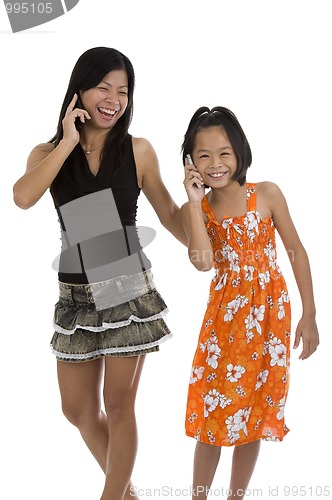 Image of mother and daughter on the phone