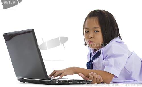 Image of asian schoolgirl with laptop