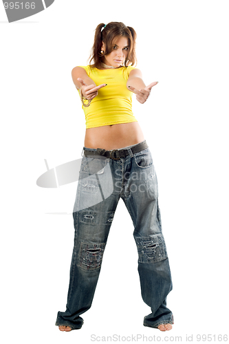 Image of Young woman wearing wide jeans