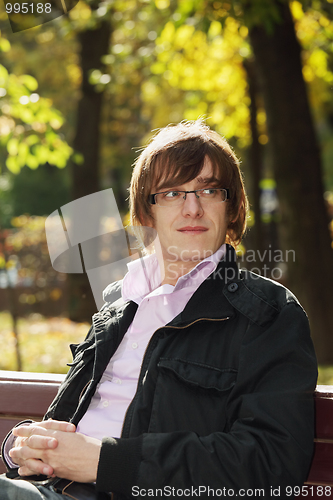 Image of Young man in park