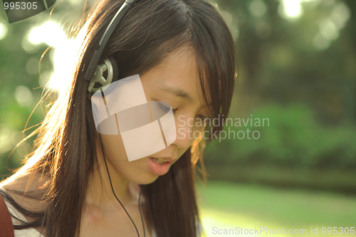 Image of girl enjoy music with headphones