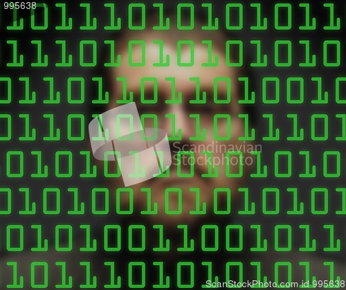 Image of Man monitoring green binary code