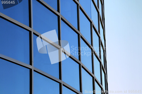 Image of Curved exterior windows of a modern commercial office building 