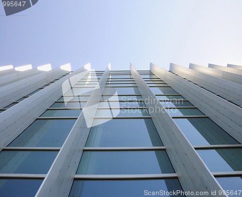 Image of Exterior windows of modern commercial office building looking up