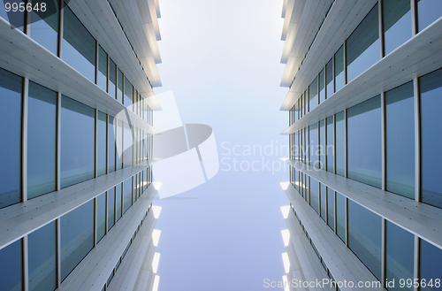 Image of Exterior windows of two identical modern buildings