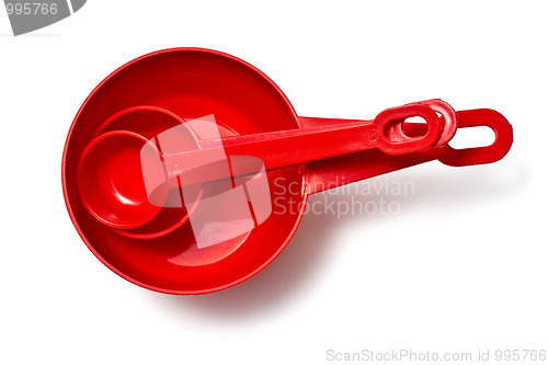 Image of Set of red measuring cups isolated on white 
