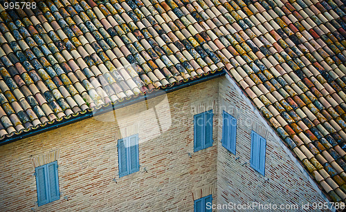 Image of brick wall and tiled roof background