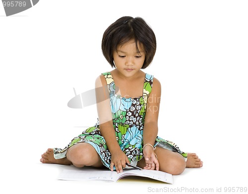 Image of cute girl with notebook and pen
